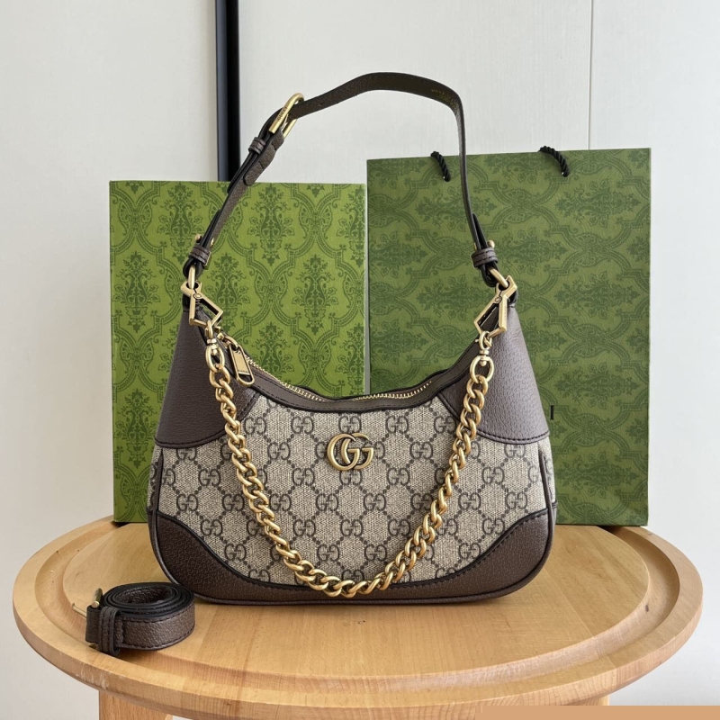 G*u*i top handle bags